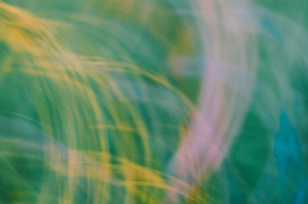 Colorful abstract paint strokes in blue, pink, yellow and green